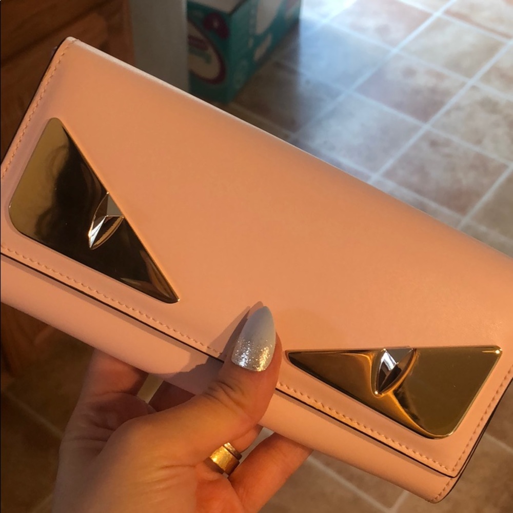 100% authentic continental Fendi monster wallet